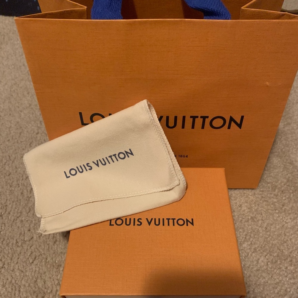 Louis Vuitton wallet size box and dust bag. No marks or odors.